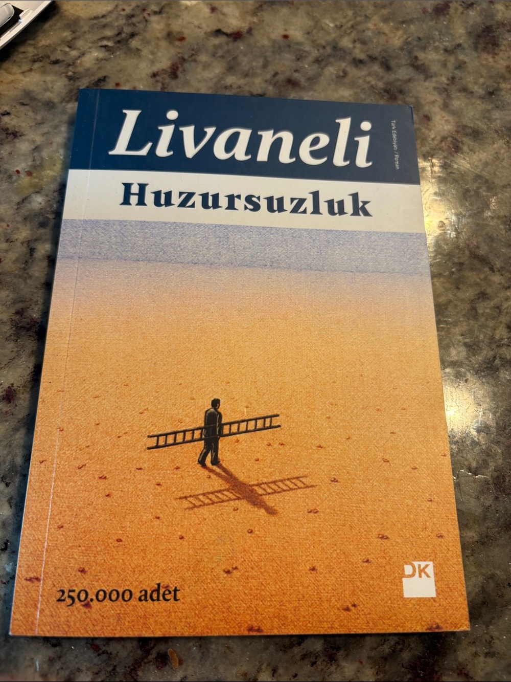 Livaneli Huzursuzluk Paperback - Blue and Sand Cover